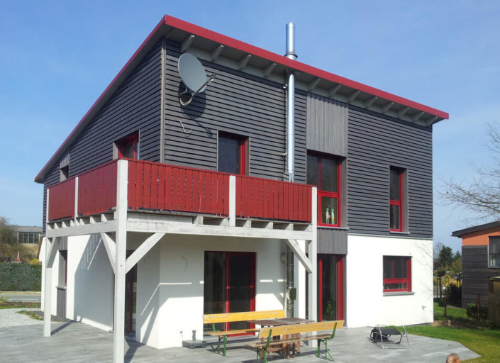 Einfamilienhaus Pultdach Holzfassade Holzhaus
