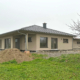 holzhausbau einfamilienhaus bungalow einliegerwohnung carport schmalfelden 7